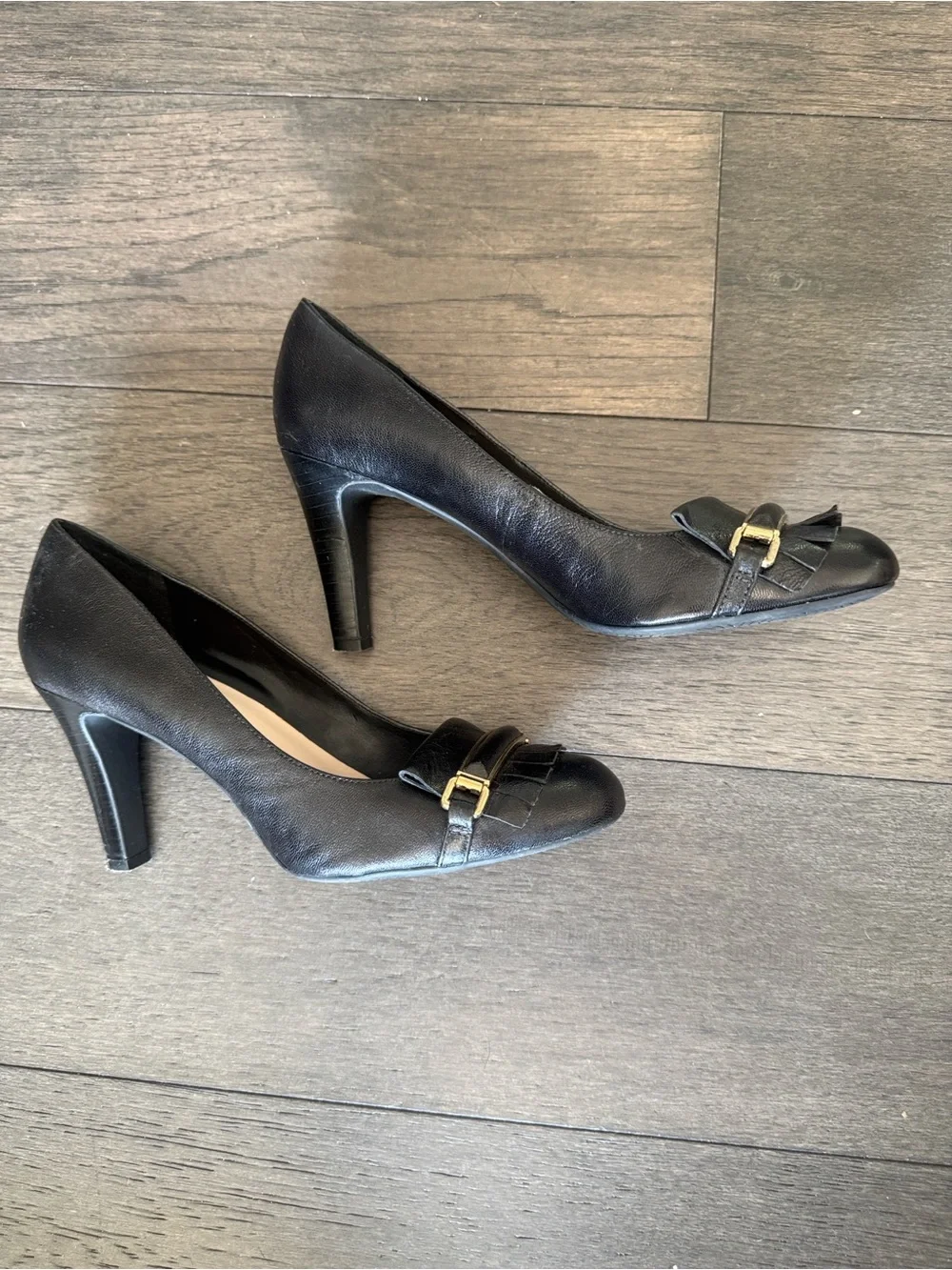 Franco Sarto Black Leather Fringe Pumps with Gold Bar